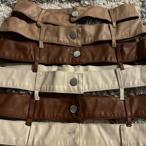 Faux leather nude cut out mini skirt.